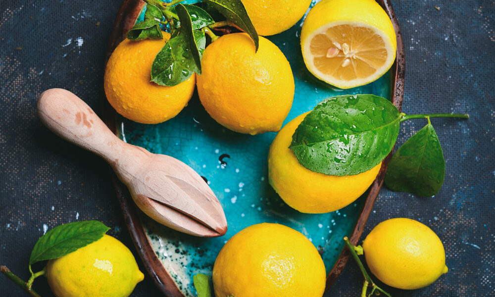 Freshly picked lemons with leaves | https://fruitsauction.com/